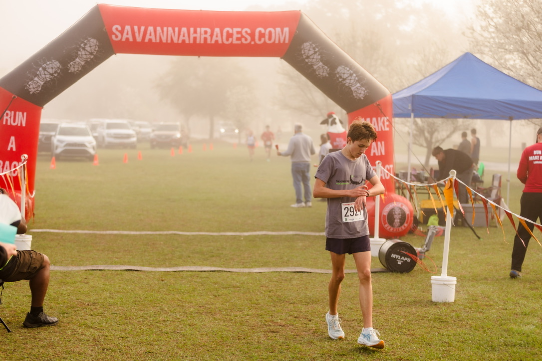 Titus Johnson walking near the finish area at a Savannah race